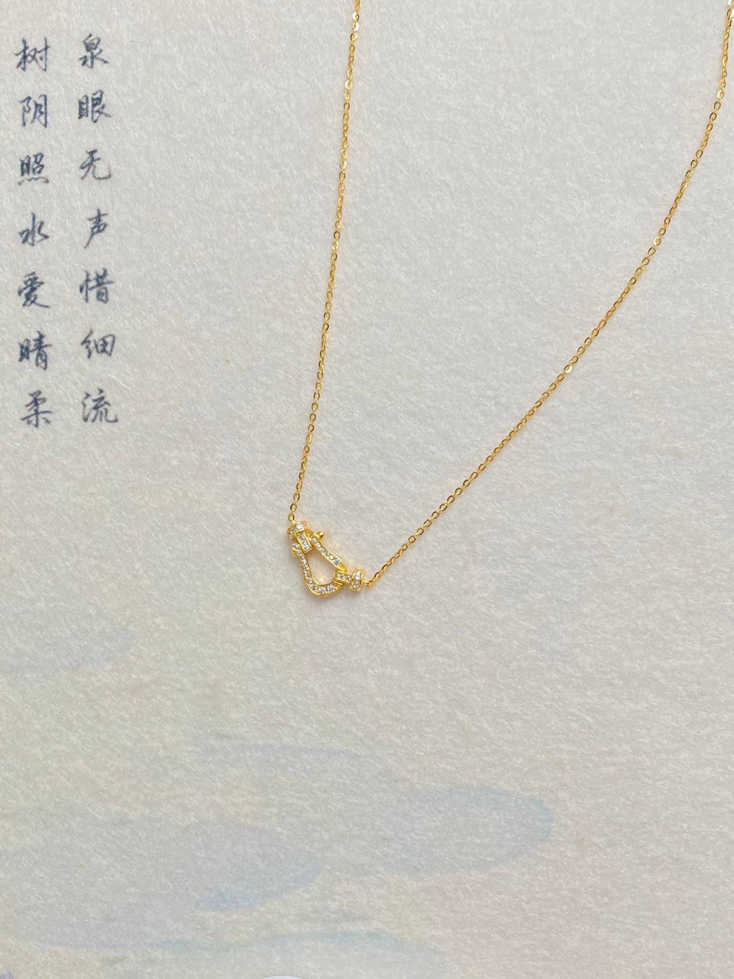 Horseshoe buckle necklace