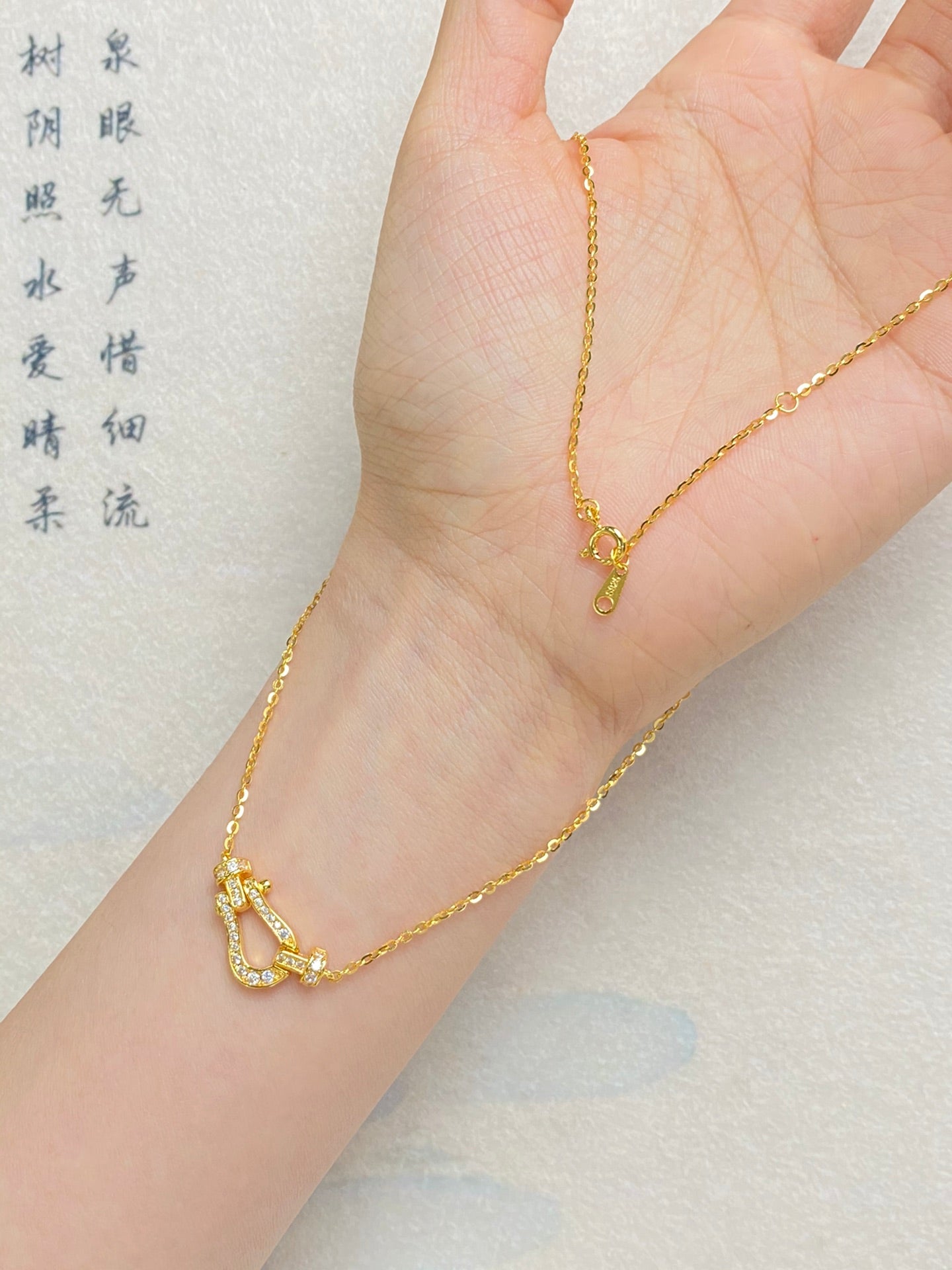 Horseshoe buckle necklace
