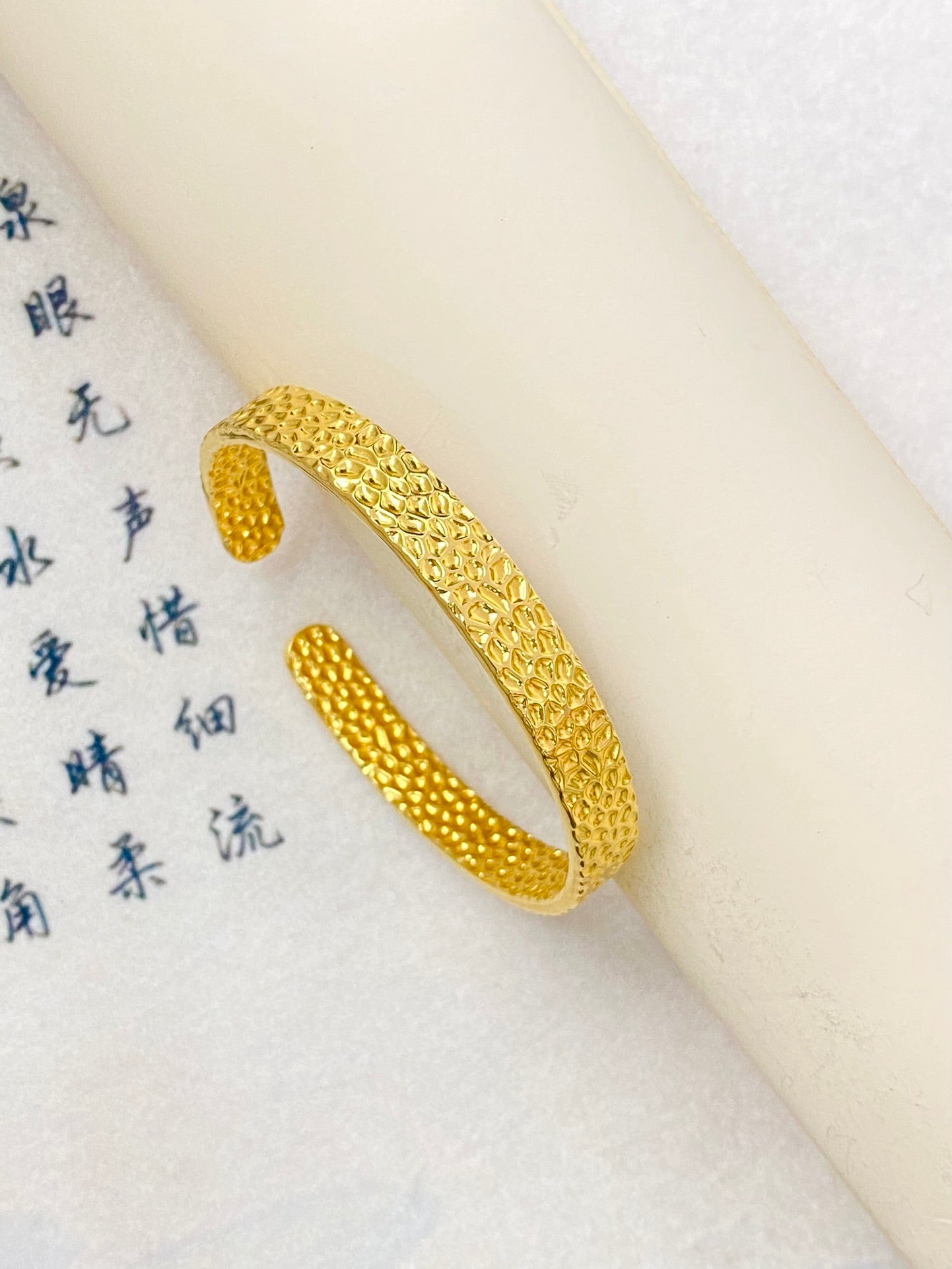 Punch patterned bracelet