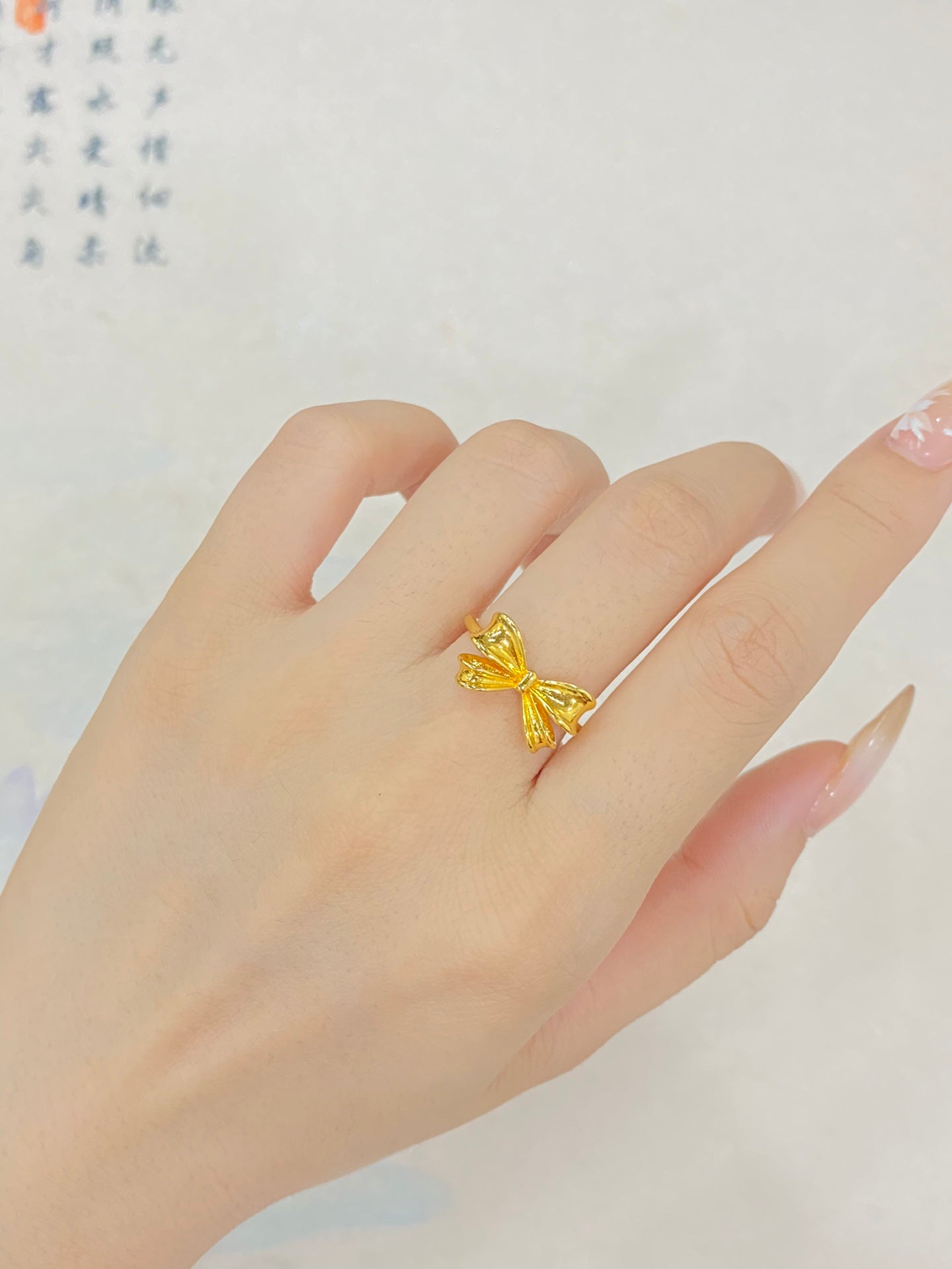 Bright bow ring