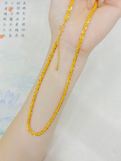 glittering gold necklace