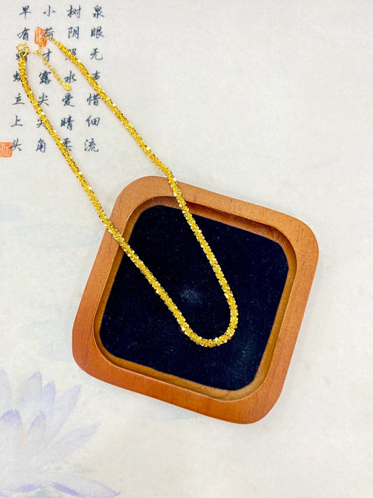 glittering gold necklace