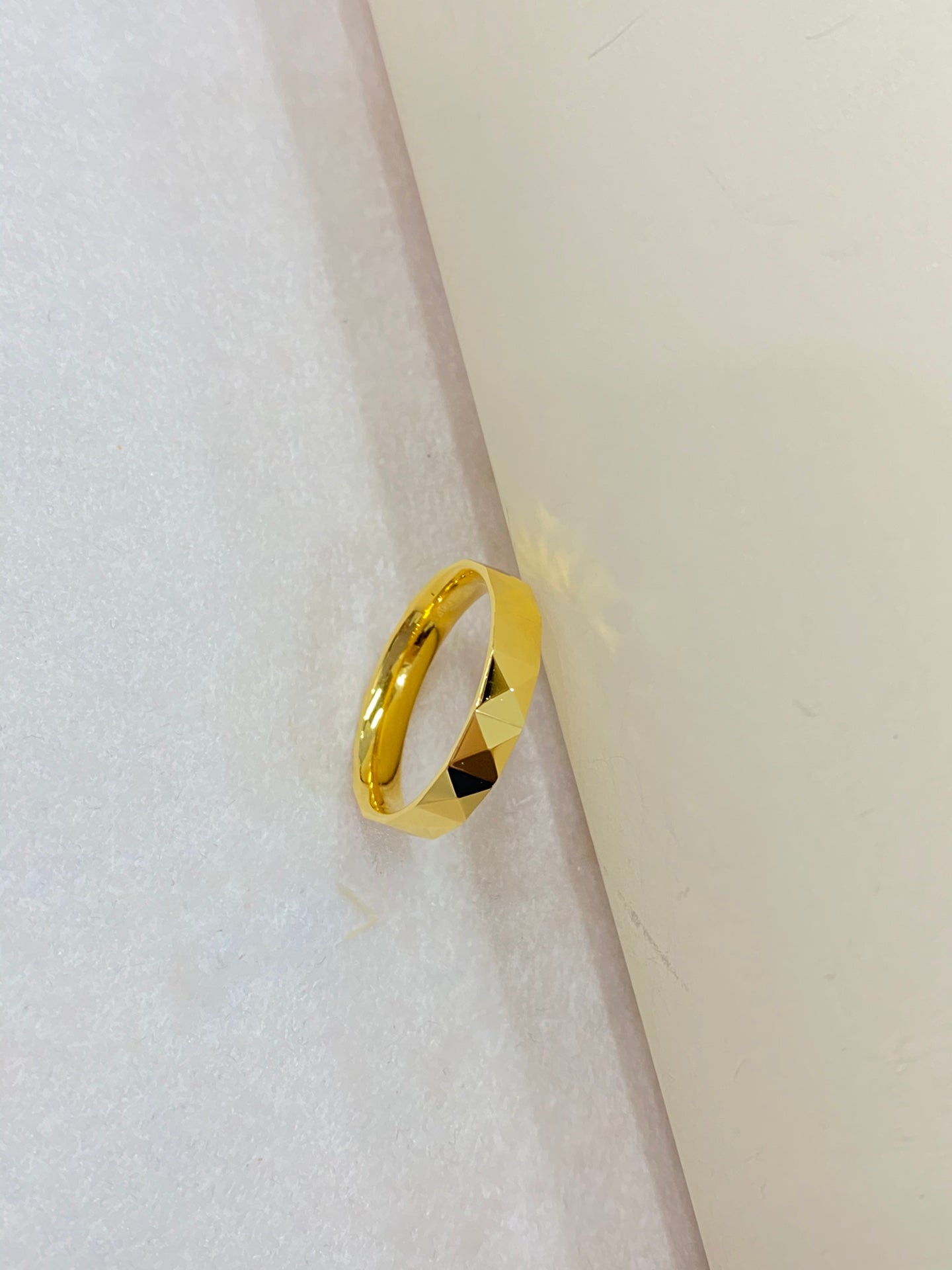 Diamond shaped square ring