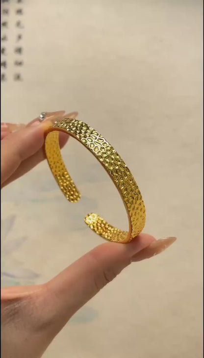 Punch patterned bracelet